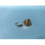 A half sovereign ring, 5.3g and an 18ct ring, 1.5g