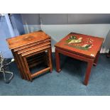 A decorative Oriental table and an Oriental nest of tables