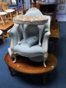 An oval coffee table, cream and blue upholstered French style chair etc.