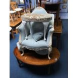 An oval coffee table, cream and blue upholstered French style chair etc.