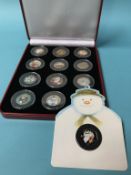 A boxed Presentation Pobjoy Mint Limited 'Snowman' Isle of Man collection coloured 50 pence set of