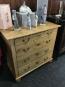 A pine chest of four long graduated drawers, 96cm wide