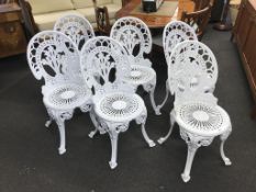 A set of six metalwork garden chairs