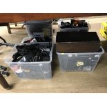 Four boxes of camera accessories