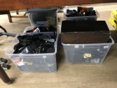 Four boxes of camera accessories