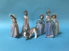 Five boxed Lladro figures and a small dog