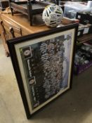 A signed Newcastle United football and a signed print dedicated to 'The Ferry Tavern'