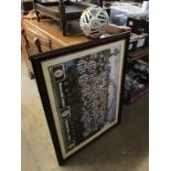 A signed Newcastle United football and a signed print dedicated to 'The Ferry Tavern'