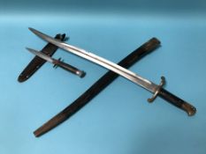 A Continental bayonet and scabbard and a William Rogers sheath knife