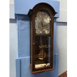 A Comitti of London mahogany cased pendulum wall clock, with four chimes, eight day movement, 74cm