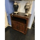 An oak linenfold cabinet