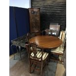 Two metalwork tables, a corner cabinet and a reproduction table with four chairs