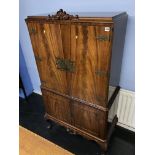 A mahogany cocktail cabinet