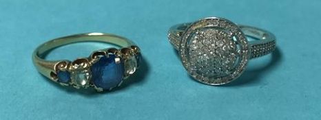 A 9ct white gold ring, 2.5 grams and an antique gold coloured ring, 2.8 grams