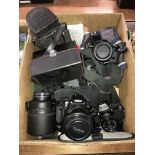 Canon EOS, Canon F1 and a Canon A-1 Sigma 600mm lens etc.