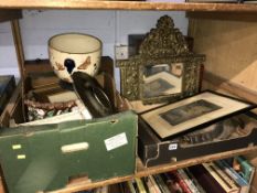Shelf of assorted, including a brass mirror