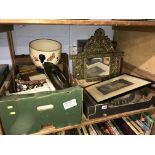 Shelf of assorted, including a brass mirror