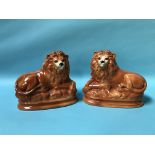 A pair of Victorian Staffordshire lions