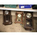 Three wall clocks