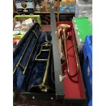 Two cased Trombones