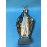 A plaster figure of the Virgin Mary