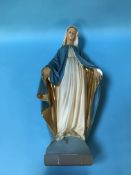 A plaster figure of the Virgin Mary