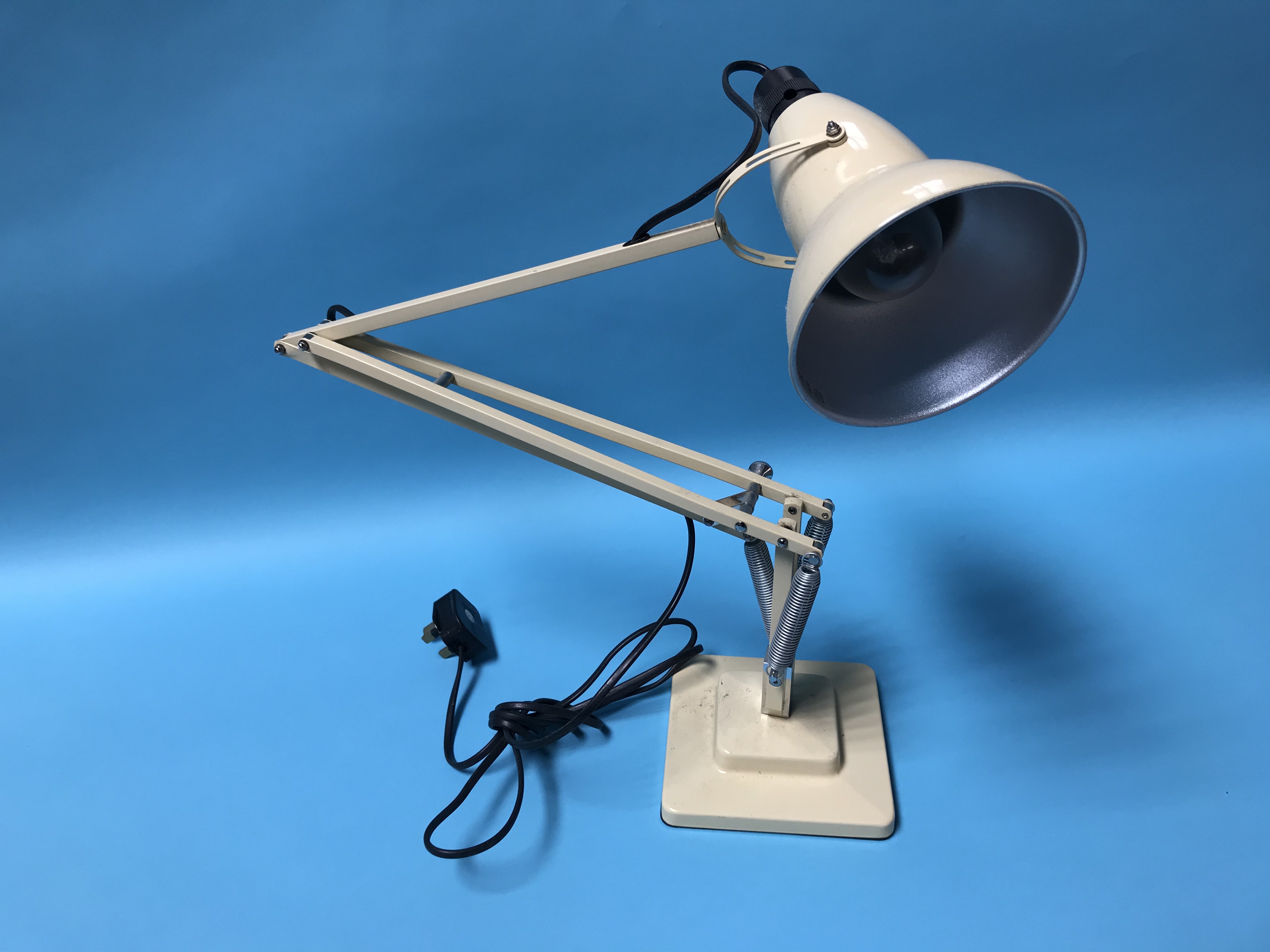 An angle poise lamp