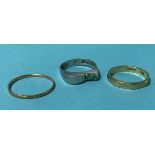 Two 18ct rings, 3.8 grams and a 14k ring, 2.2 grams