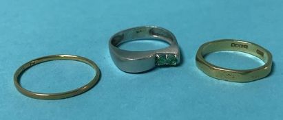 Two 18ct rings, 3.8 grams and a 14k ring, 2.2 grams