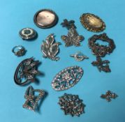 A bag of assorted costume jewellery, brooches etc.