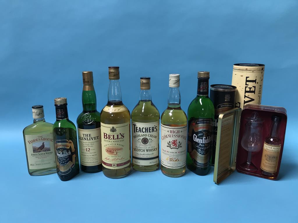 Eight various bottles of whisky