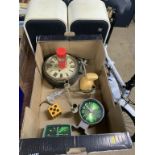 A box of assorted, to include a Bulkhead clock and a pair of speakers