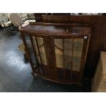 A walnut china cabinet