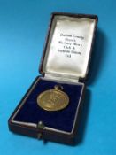 A 9ct gold fob 'Durham County Working Men's Club', 9.5g