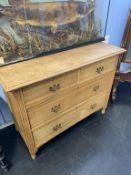 An Edwardian oak chest of drawers