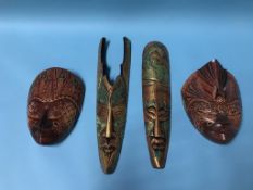 Four decorative masks