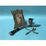 A silver frame, silver cup and kukri etc.