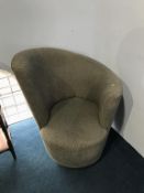 A pair of grey upholstered armchairs