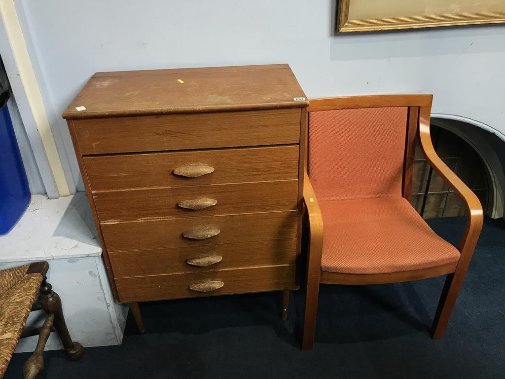 A teak chest of drawers and a Klaessons of Sweden chair