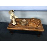 An Oriental style coffee table, glove box, decorative figures etc.