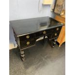 A black painted pine desk