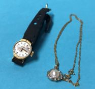 A ladies watch stamped '585' and a necklace stamped '375'