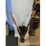 A metalware umbrella stand