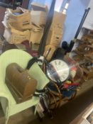 A rocking chair, wall clock and golf clubs etc.