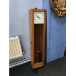 A cased Gents electric regulator wall clock