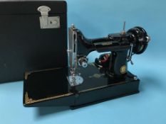 A cased sewing machine, 221k