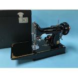 A cased sewing machine, 221k