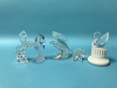 Five boxed Swarovski glass figures, to include 'Rearing horse', 'Leaping whales', a 'swan' etc.