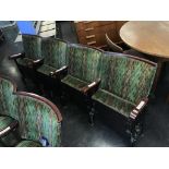 A single row of four vintage cinema seats