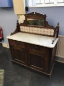 A marble and tiled back washstand